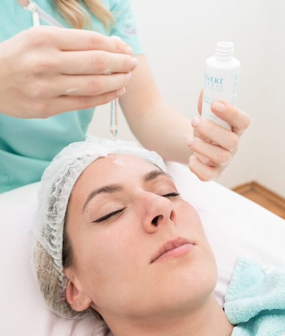 Facial treatment on young woman